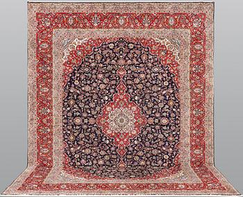 A Keshan carpet, approx. 397 x 307 cm.