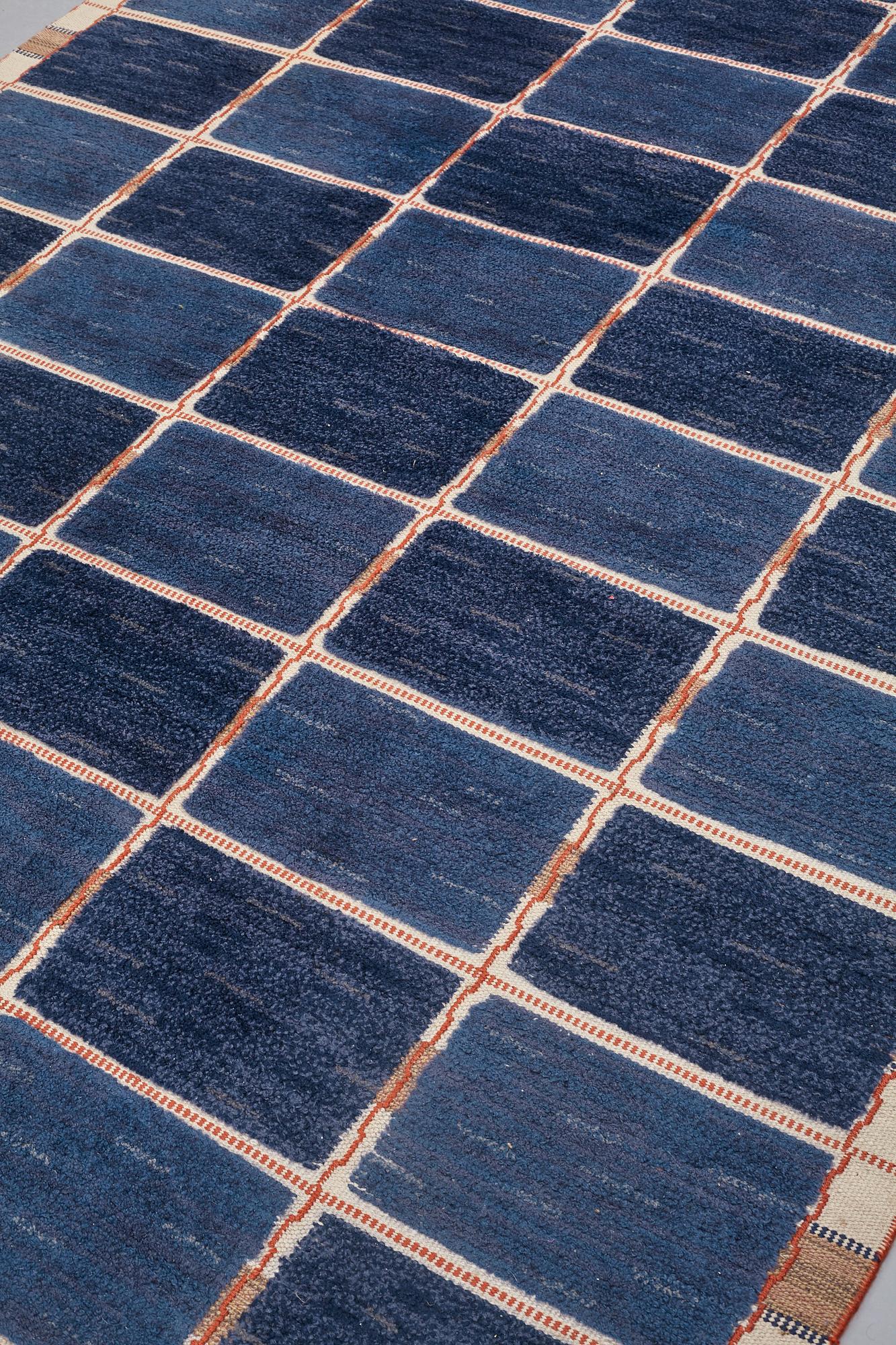 Märta Måås-Fjetterström, A CARPET, "Rutig blå halvflossa", knotted pile in relief, ca 304 x 209,5 cm, signed AB MMF.