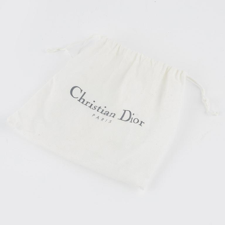 Christian Dior, A vintage 'Mini saddle clutch'.