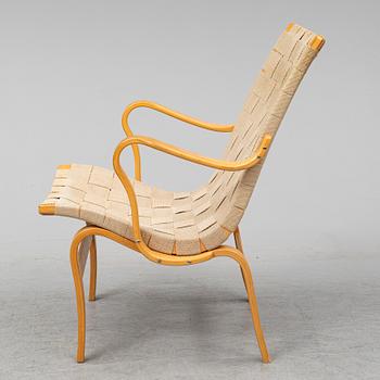 A beech Bruno Mathsson 'Eva' armchair from Dux.