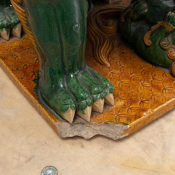 A pair of sancai-glazed chinese buddhist lions or guardian lions, early 20th century.