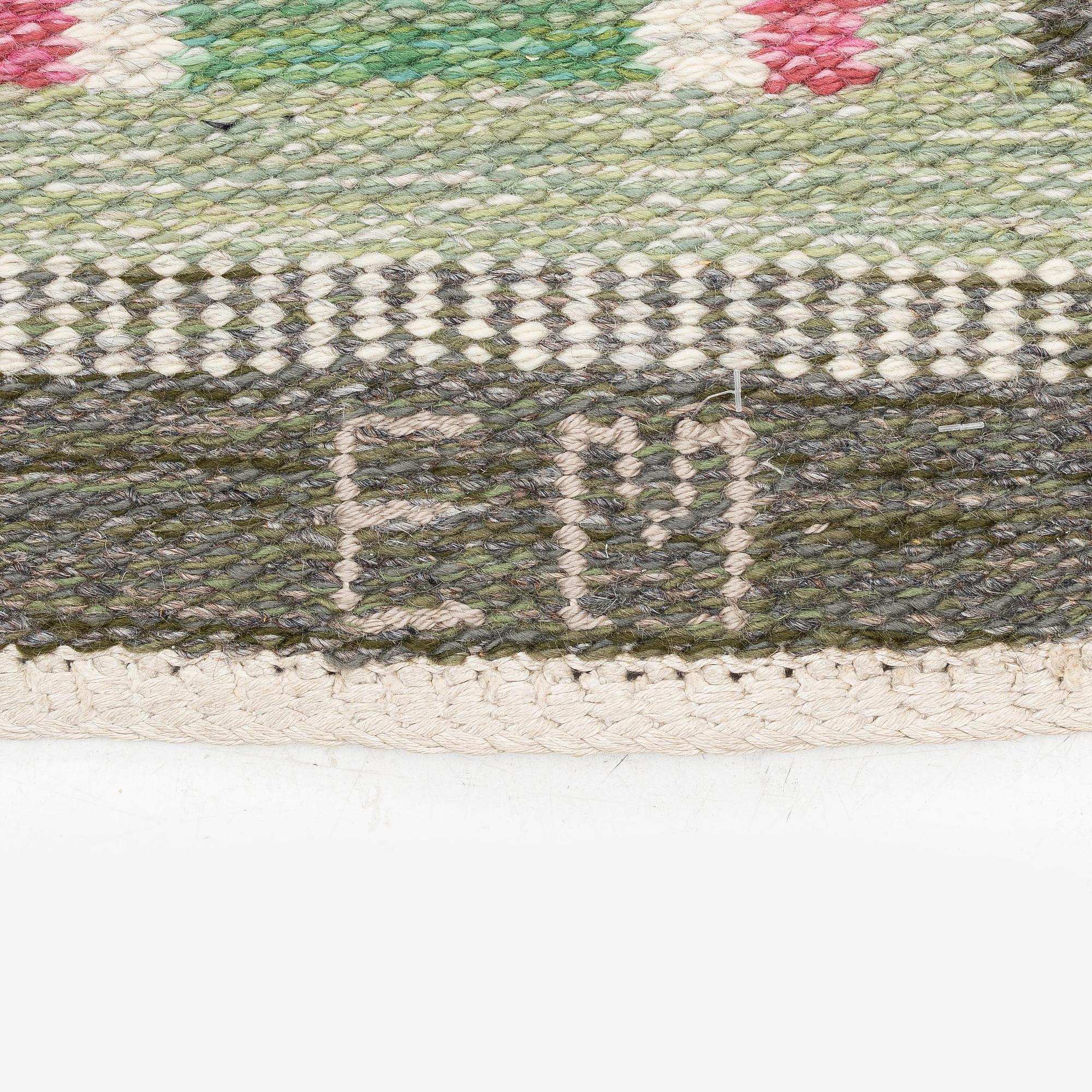 Edna Martin, a flat weave runner, c. 335 x 104 cm signed SH EM.