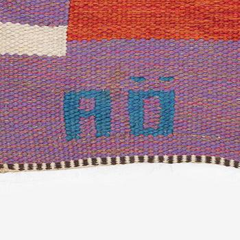 Agda Österberg, a flat weave and tapestry weave carpet, c. 330 x 123 cm, signed AÖ.