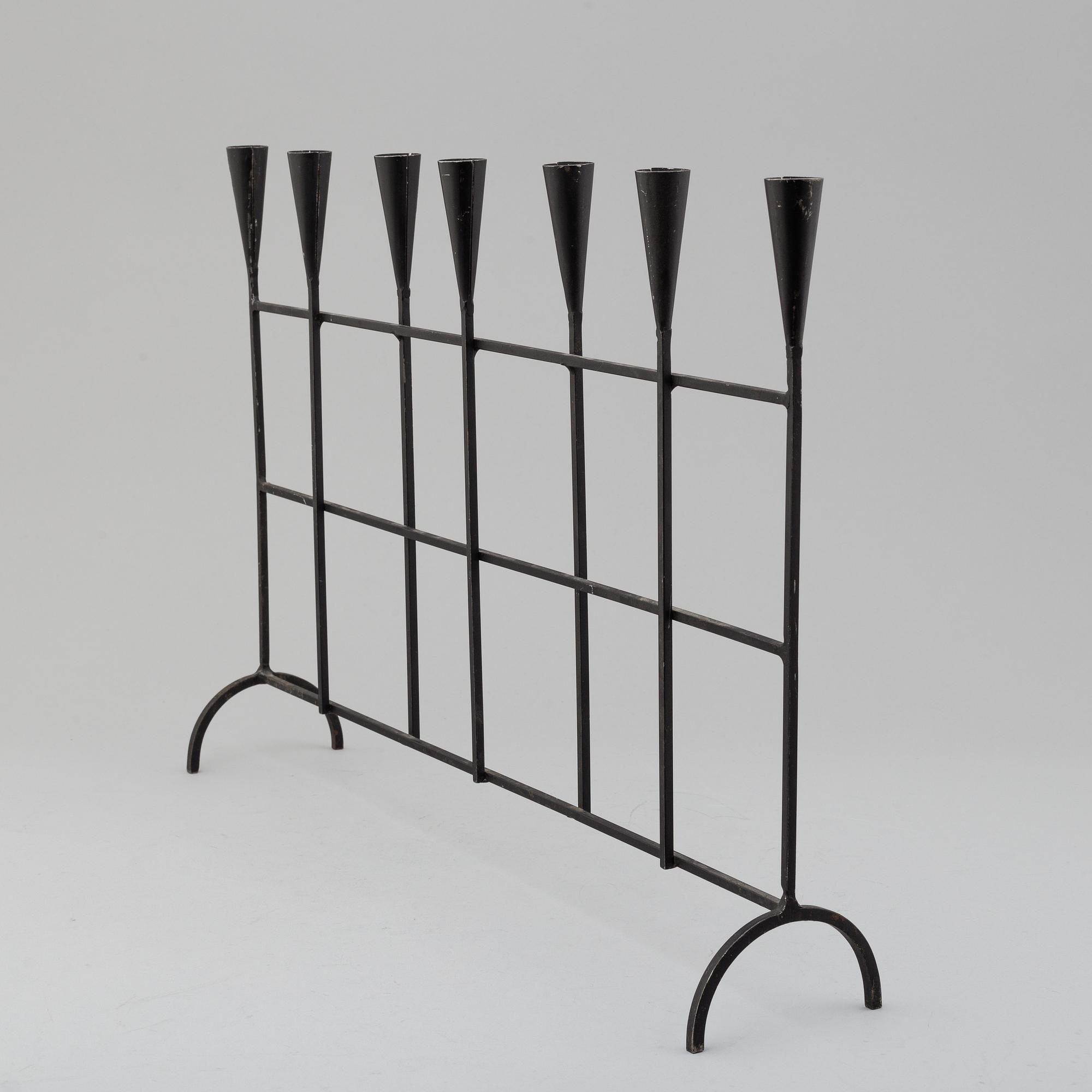 a iron candelabra, 20th century.