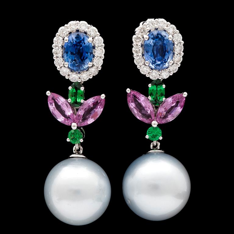 A pair of sapphire, tsavorite and cultured South sea pearl earrings.