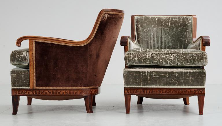 A pair of Swedish armchairs with stylized inlays, 1920-30's.