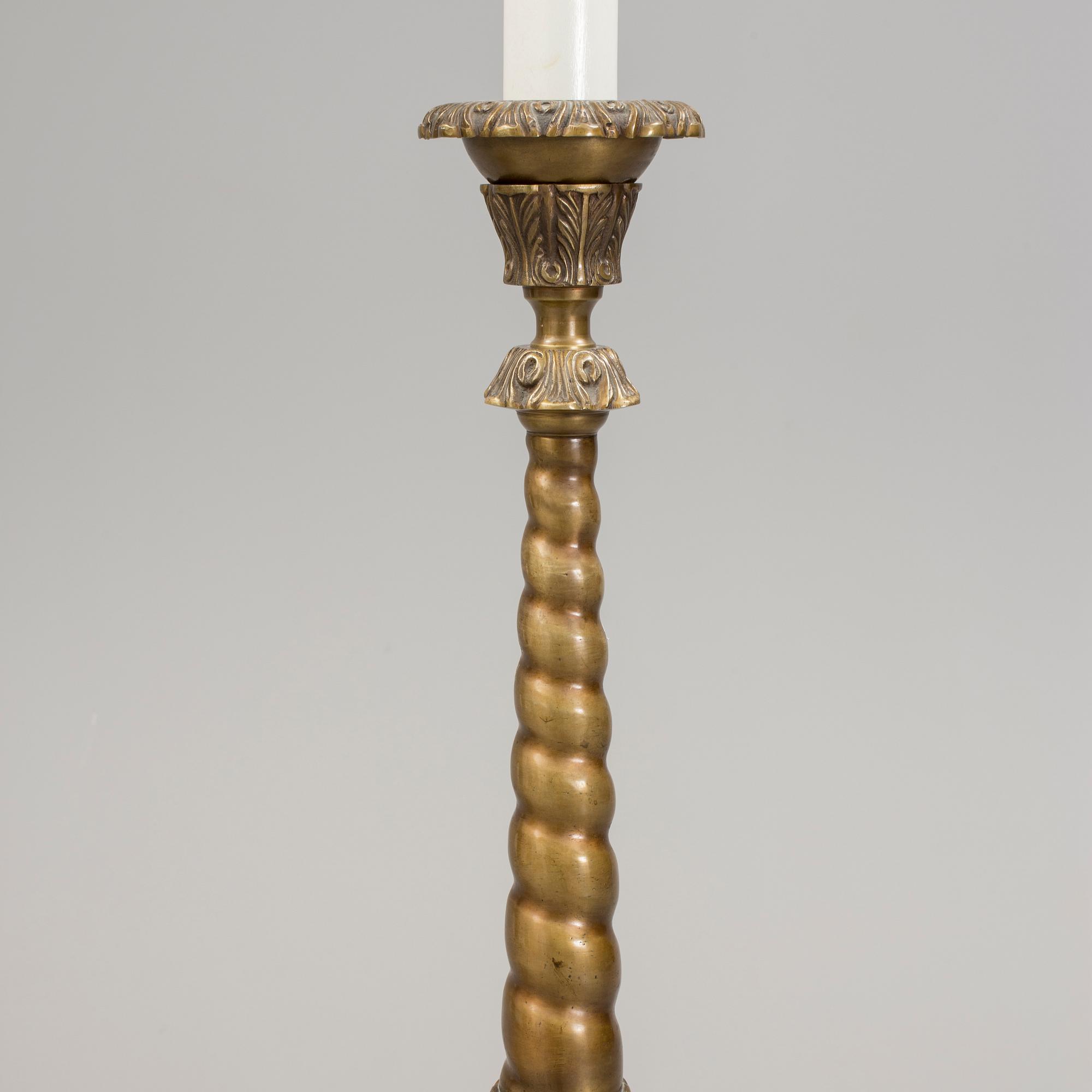 a early 20h Century brass floor lamp.