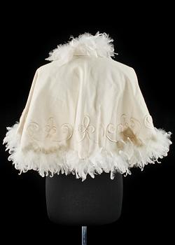 A cream colored silk wedding dress/evening dress by Mea.