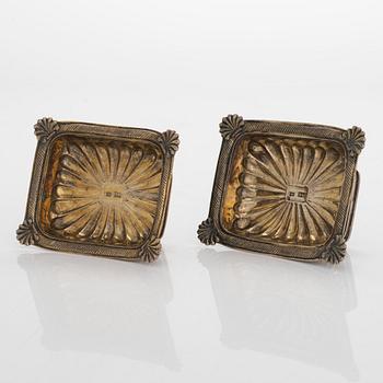 Two pairs of parcel-gilt salt cellars, latter half of the 19th century.