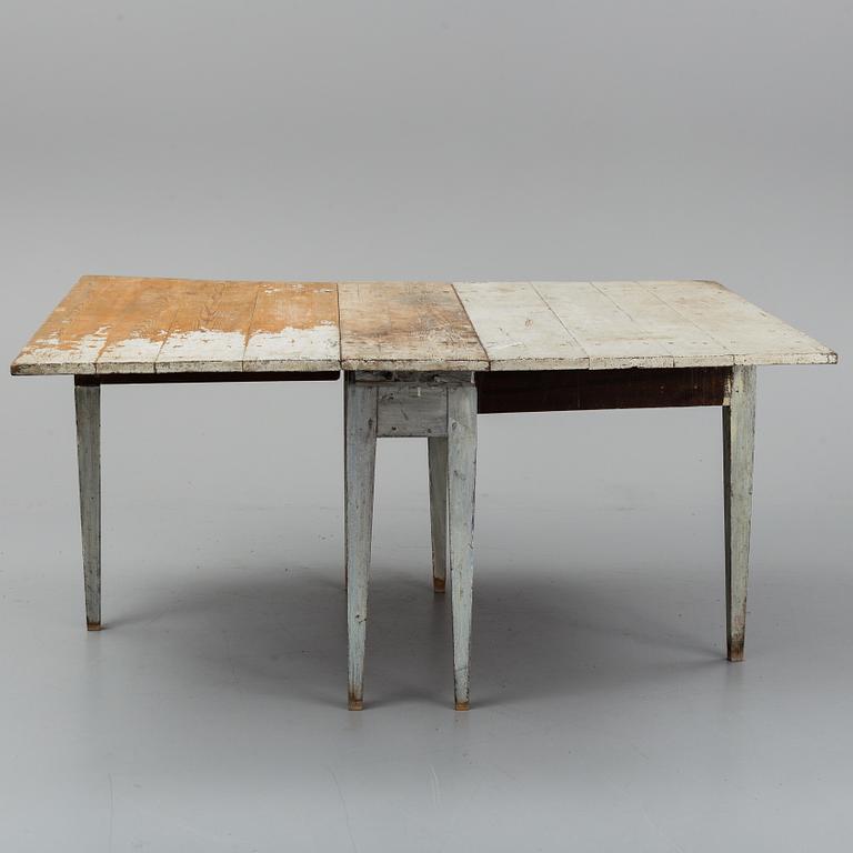 An early 19th century gate leg table.