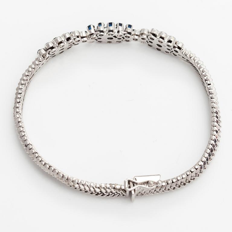 Rannekoru, 18K valkokultaa, safiireja ja timantteja n. 0.18 ct yht.
