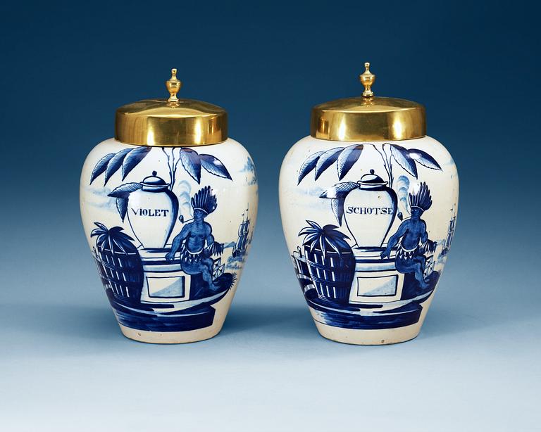 A pair of Dutch fainece tobacco jars, 18th Century.