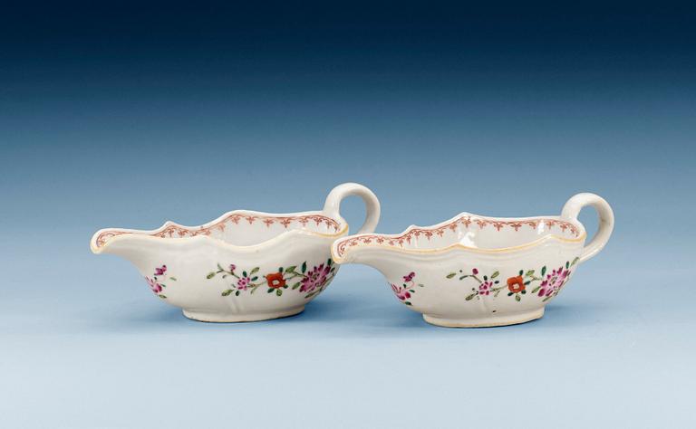 A pair of famille rose sauceboats, Qing dynasty, Qianlong (1736-95). (2).