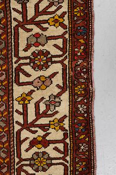 A rug, antique Kurdish, ca 247-253 x 116-125 cm.