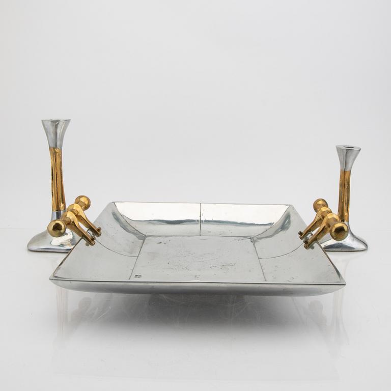 David Marshall, a bowl and two candle sticks.
