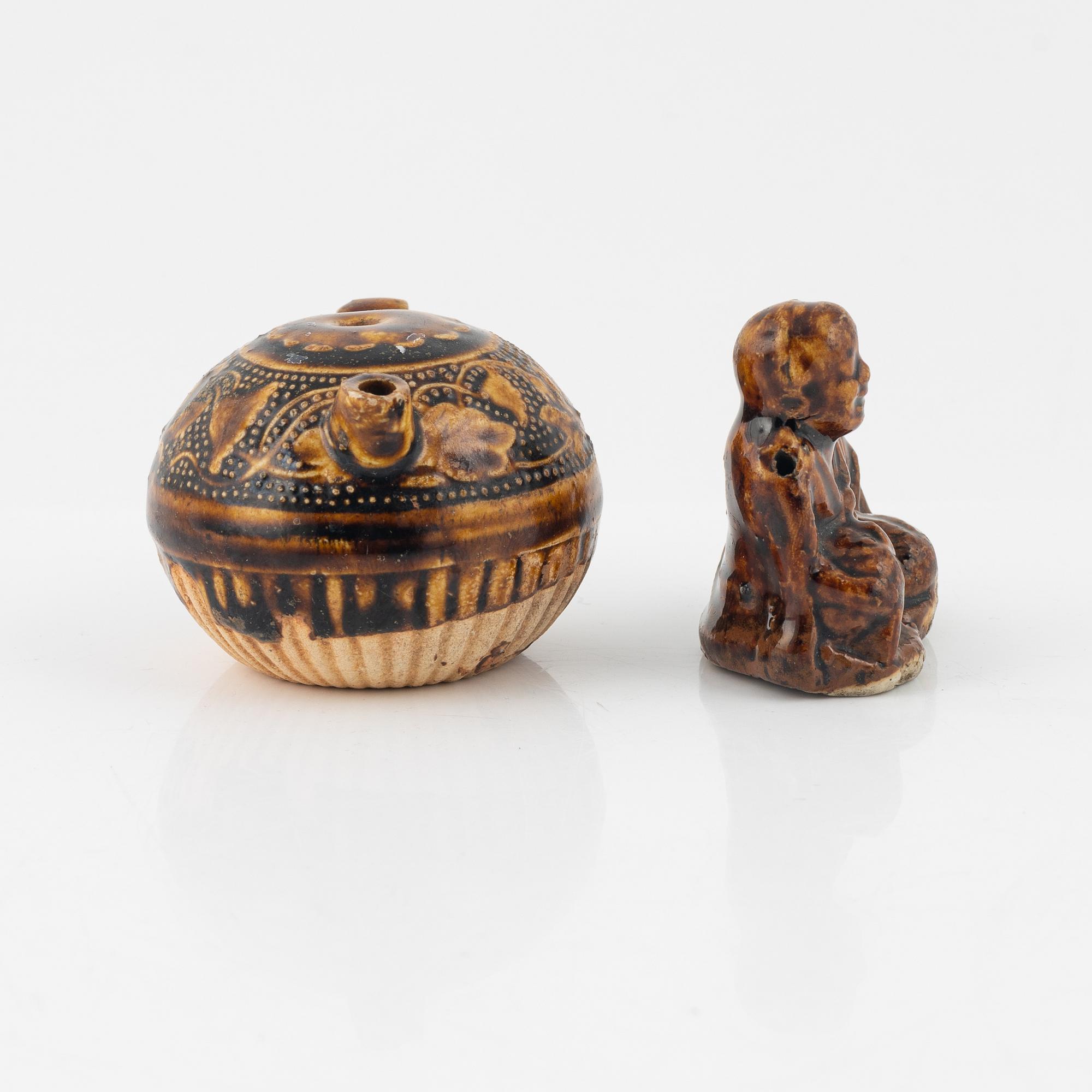 A brown glazed water dropper and a brush rest, Qing dynasty, 19th Century.