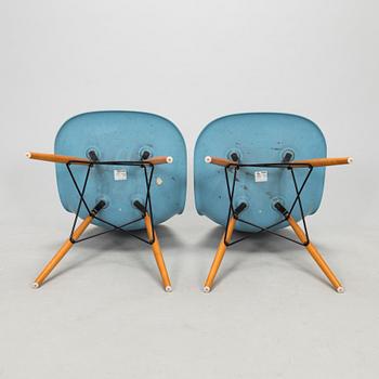 Charles & Ray Eames, four 'DWS' chairs for Vitra 2006.