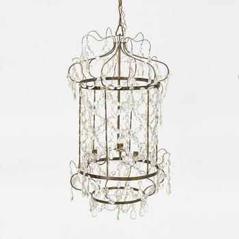 A three-light Gustavian-style hanging light, circa 1900.