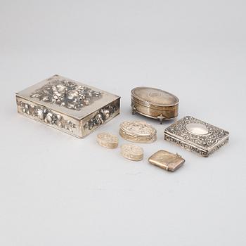 7 silver boxes.