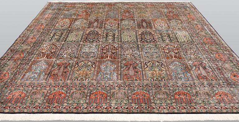A silk Kashmir carpet, 286 x 265 cm.
