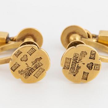 A pair of Wiwen Nilsson 18K gold earrings.