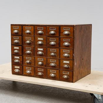A pine cabinet with drawers, first half of the 20th Century.