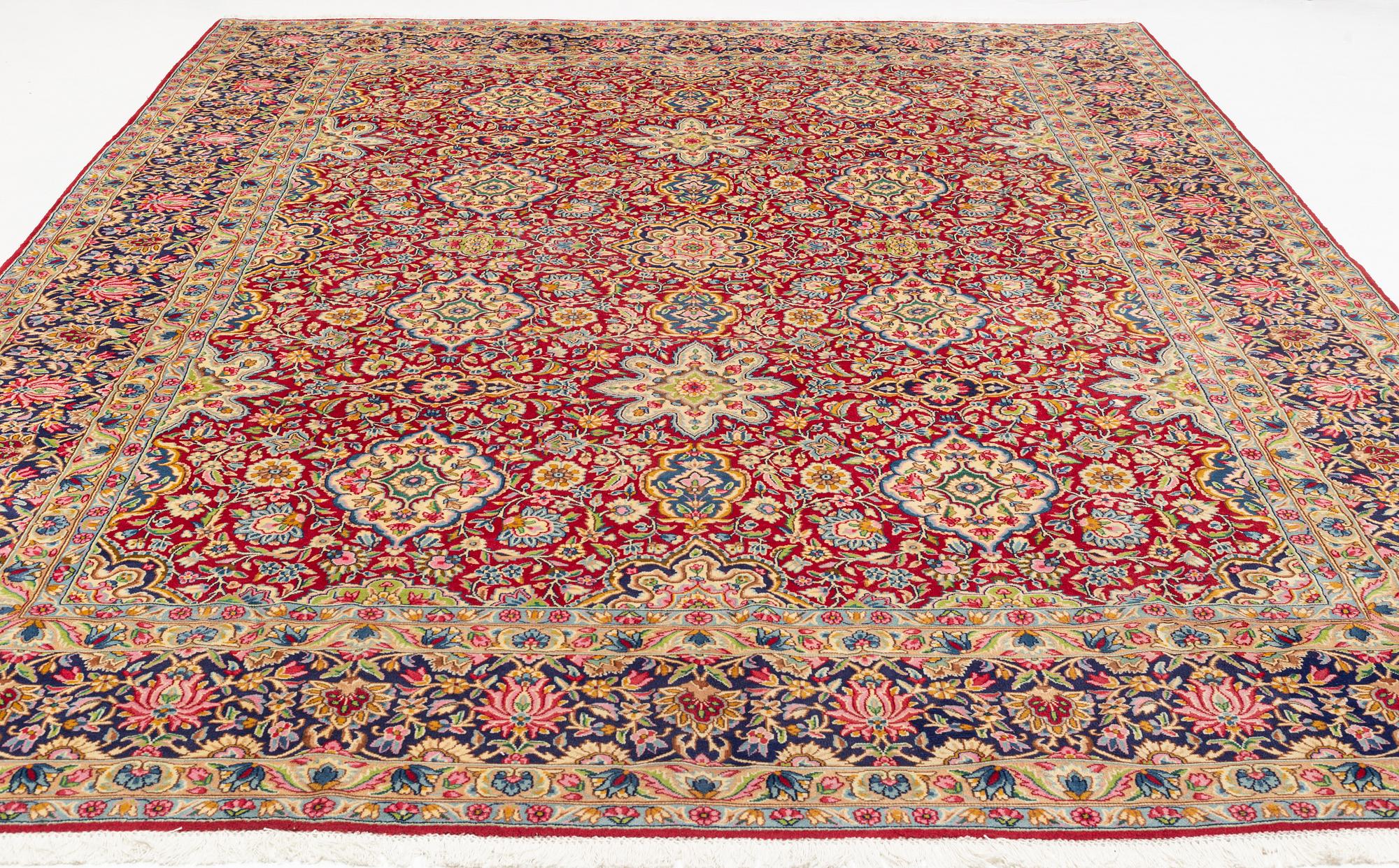 A Kerman carpet, 438 x 298 cm.