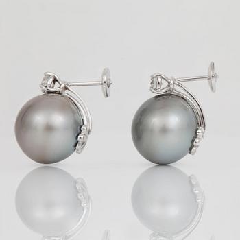 A pair of cultured Tahiti pearl, Ø 16 mm, and brilliant-cut diamond earrings.