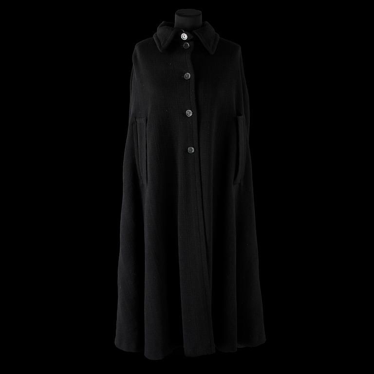 A black 1960s/70s cape by Hermès.