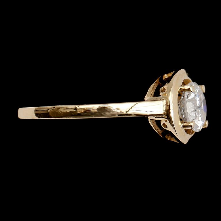 RING, 14 k guld, solitär briljantslipad diamant 0.81 ct.