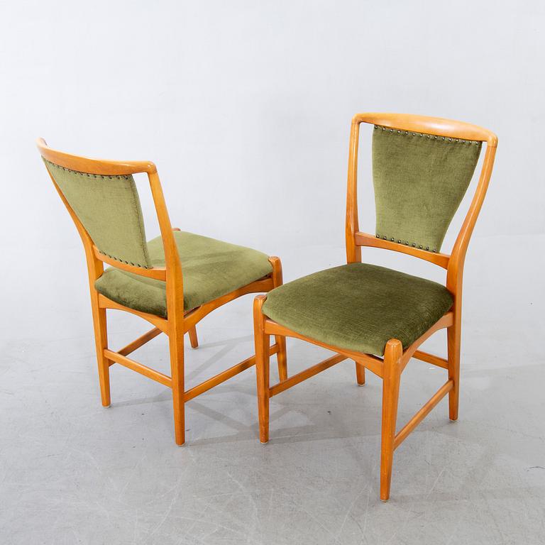 David Rosén, A table and flour chairs.