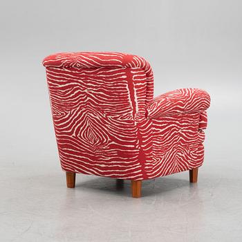 Josef Frank, a model 568 armchair, Firma Svenskt Tenn, Sweden.