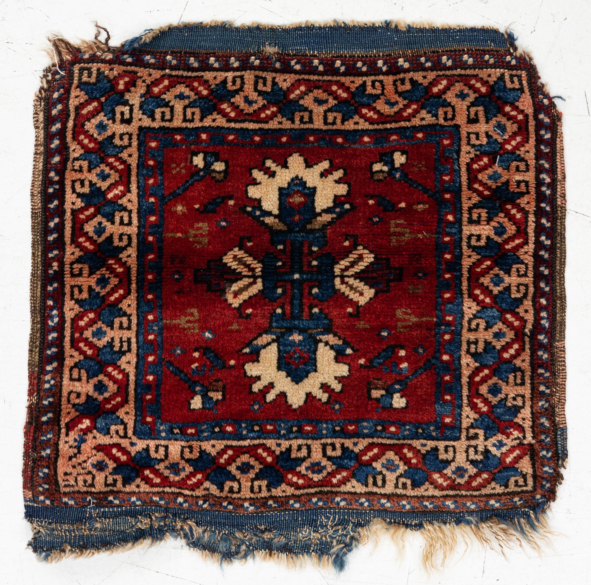 An Antique Saddlebag, so-called Heybe, Anatolia, c. 47 x 45 cm.