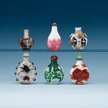 1451. A set of six Chinese Peking glass snuff bottles.