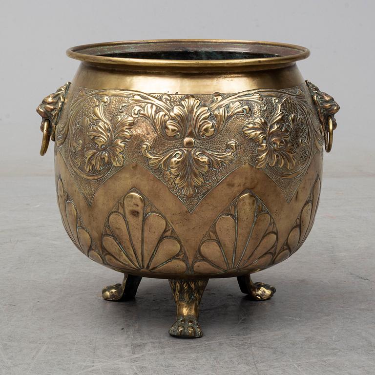 An 18th century brass flower pot.