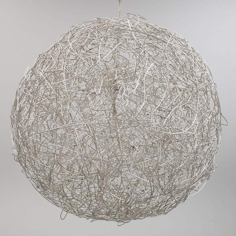 A 'Fil de Fer Ovale' ceiling light by Enzo Cattelini.