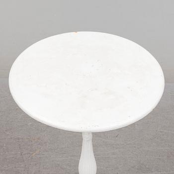 an early 20th century cast iron table.
