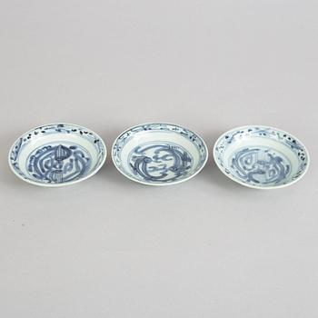 A set of three small blue and white dishes, Ming dynasty (1368-1644).