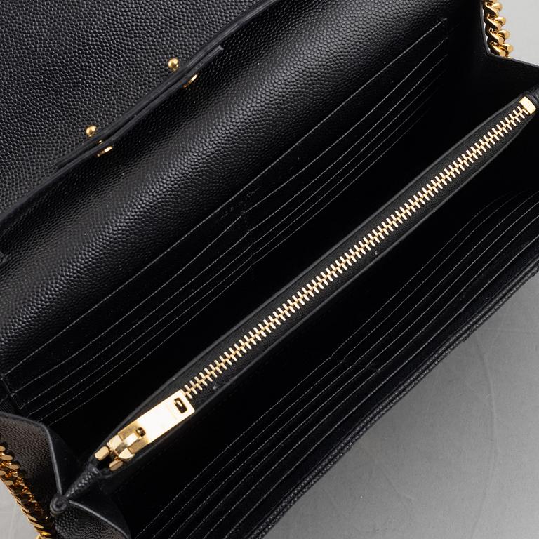 Yves Saint Laurent, a handbag/clutch.