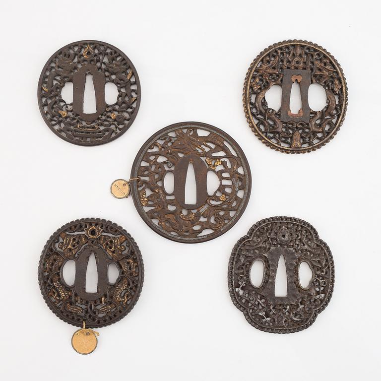 Five iron tsubas, China and Japan, 18/19th Century.