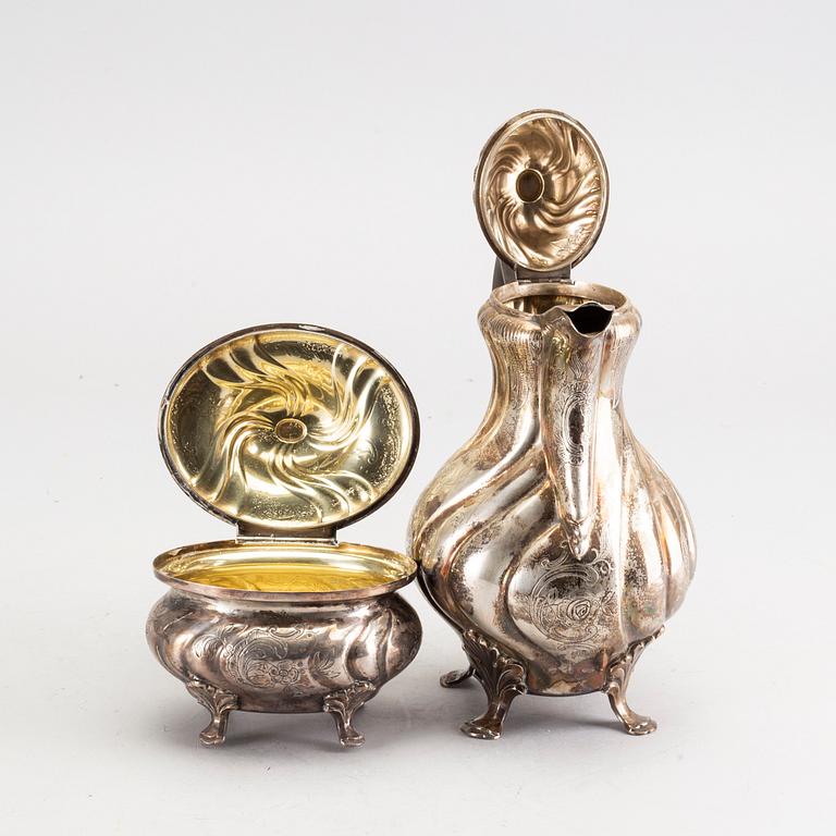 A Swedish 20th century coffeepot and suger bowl in silver mark of CG Hallberg Stockholm, total weight ca 1100 gr,