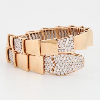 Brilliant-cut diamond snake bangle.