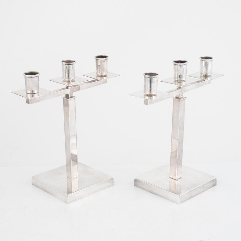 Rolf Engströmer, attributed to, a pair of silver-plated candelabra, Fabriksaktiebolaget Kronsilver, Sweden 1930s.