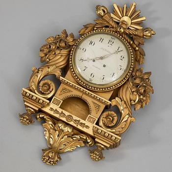 Wall clock, Gustavian style, P.N. Wohlin, Stockholm, 20th century.