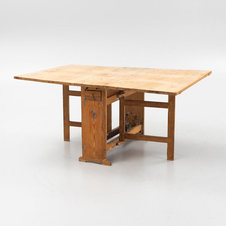 A pine gate-leg table, first part of the 19th century,