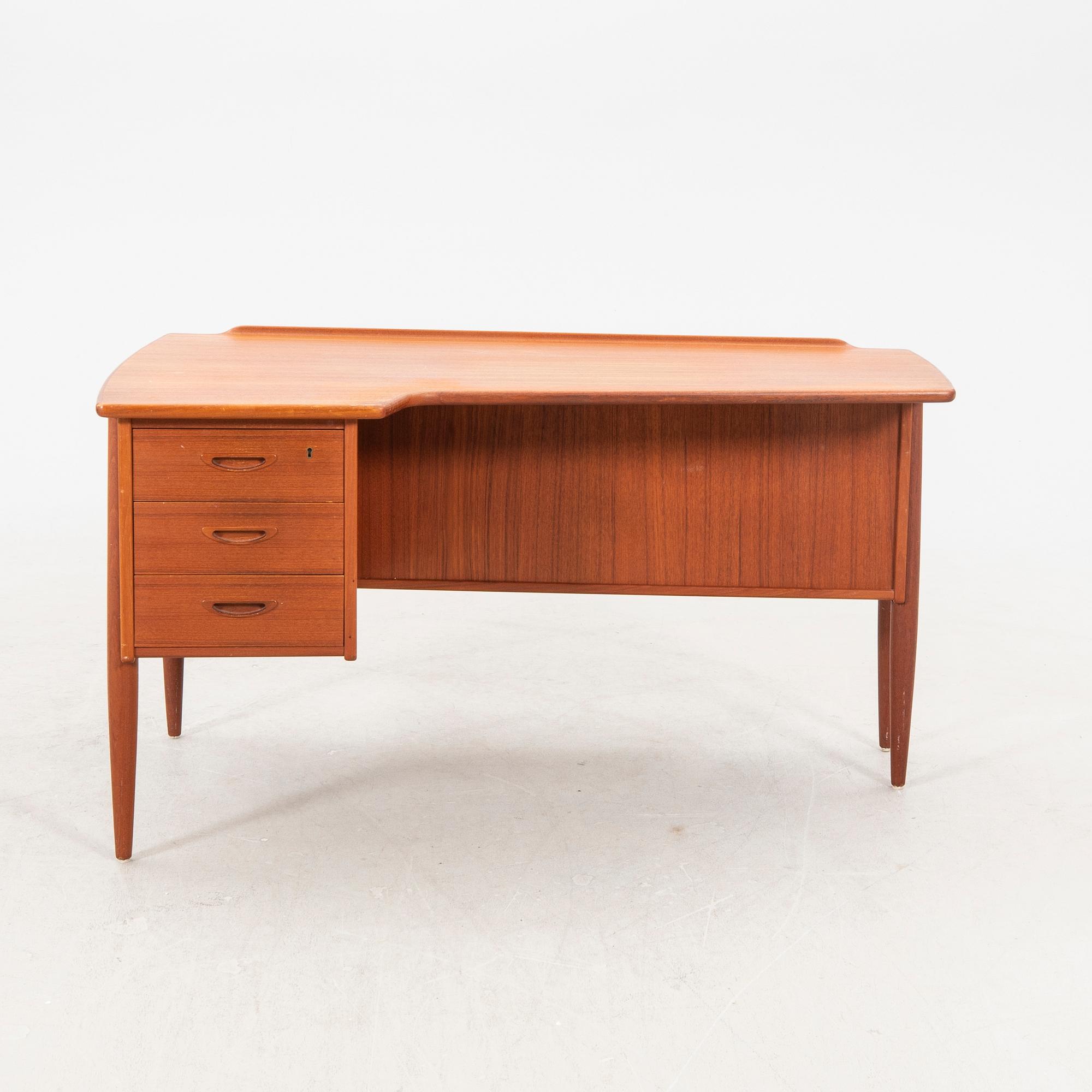 A 1950/560s teak desk from Lelångs mböelfabrik.