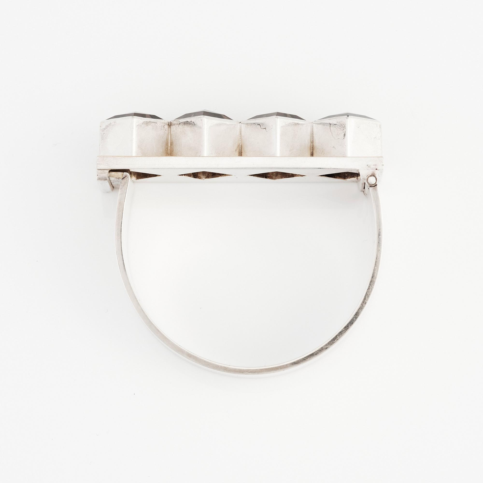 Sigurd Persson, armring, Stockholm 1963, sterling silver, delvis förgyllt och rökcitrin, smed Peter Schmitt.
