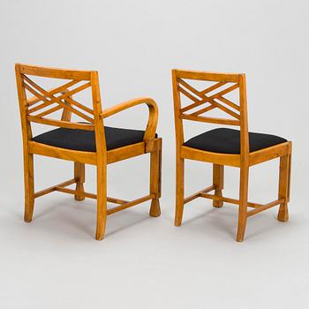 A 1920s/30s century dining table and set of 6 + 2 chairs.