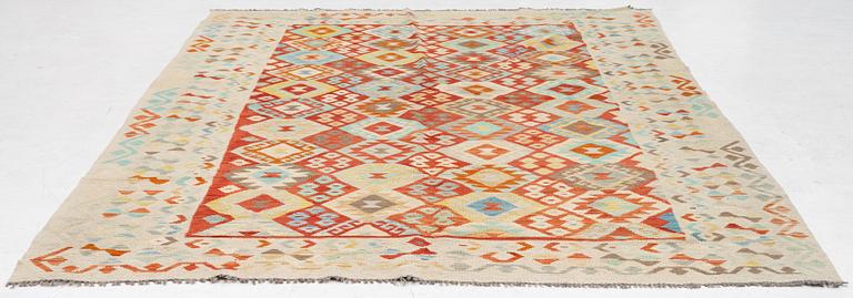 A Kilim carpet. ca 295 x 208 cm.