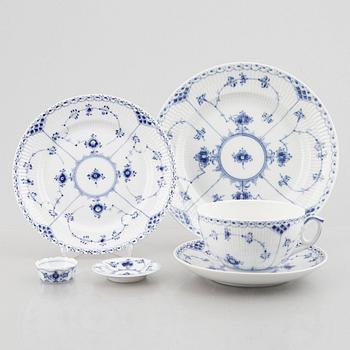 20-pieces of a half lace "Musselmalet" porcelain tea service, Denmark, of varying dates of manufacture, 20th century.